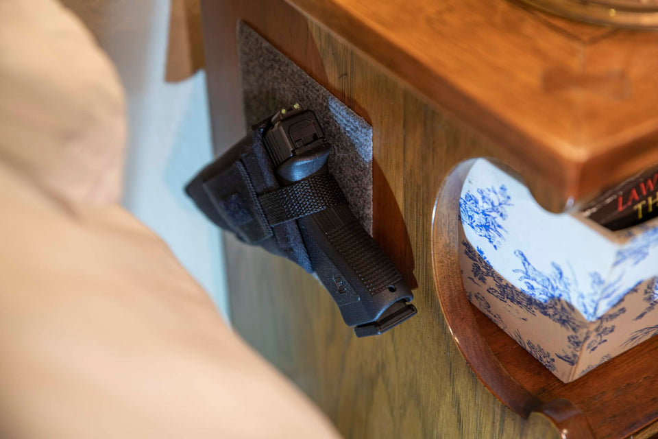Kohroo Tactical Holster hanging on nightstand for quick emergency access